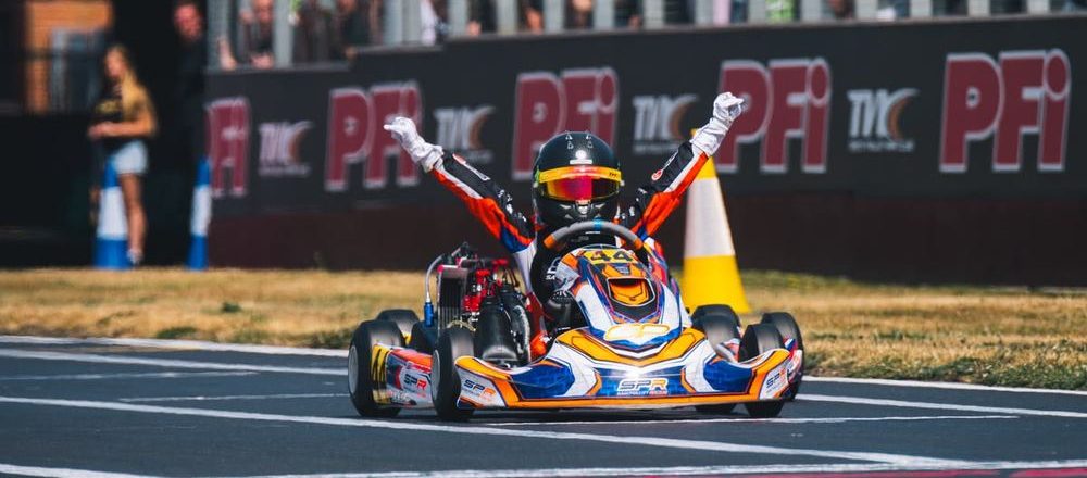 Jayan Prakash crosses the finish line to win Kartmasters.